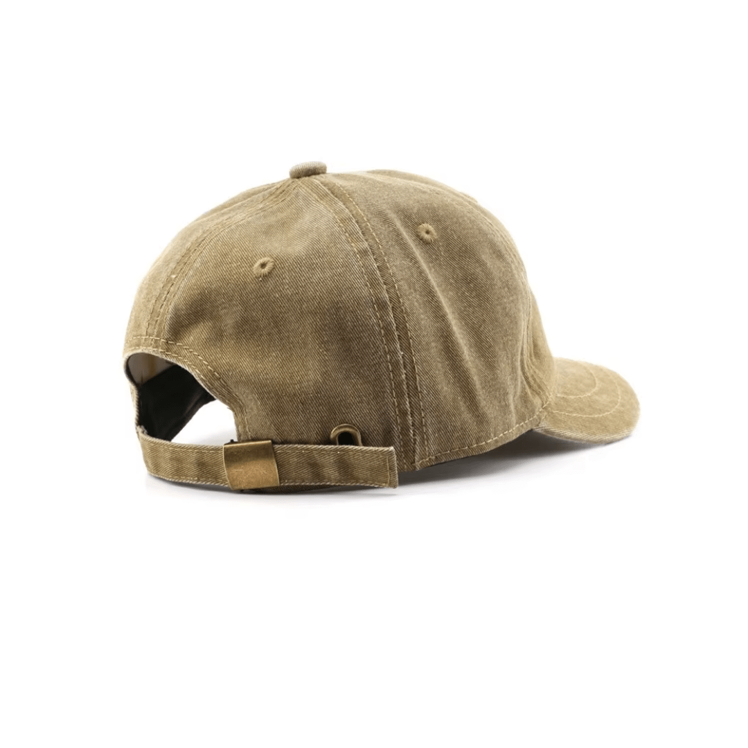 Back view of vintage baseball cap with metal buckle and clean, logo-free look