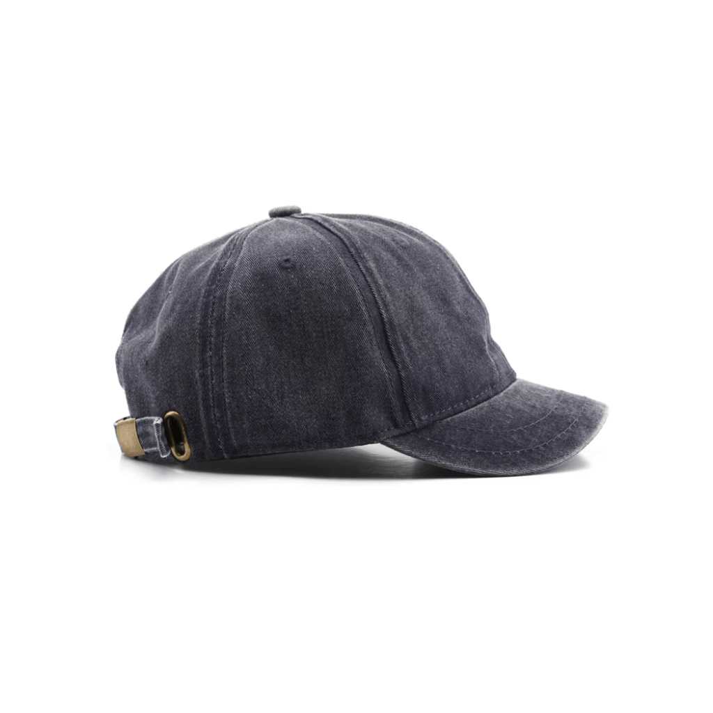 Classic khaki dad hat with no visible branding, captured in a natural angled pose for everyday styling