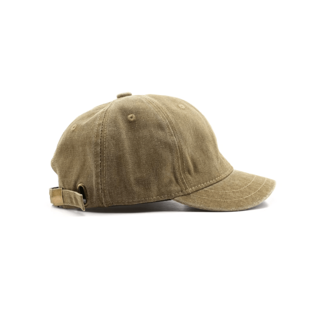 Vintage logo-free khaki baseball cap – angled view showing short brim and classic panel design