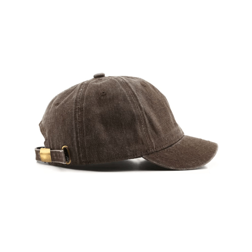 Washed cotton baseball cap in vintage brown tone – minimalist design with subtle curves and no logo